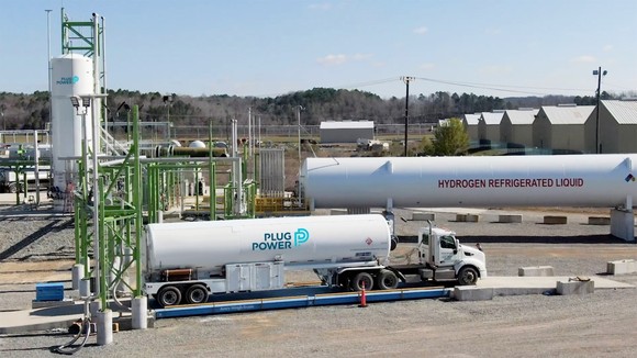 Hydrogen facility with Plug Power tanker truck filling up with liquid hydrogen.