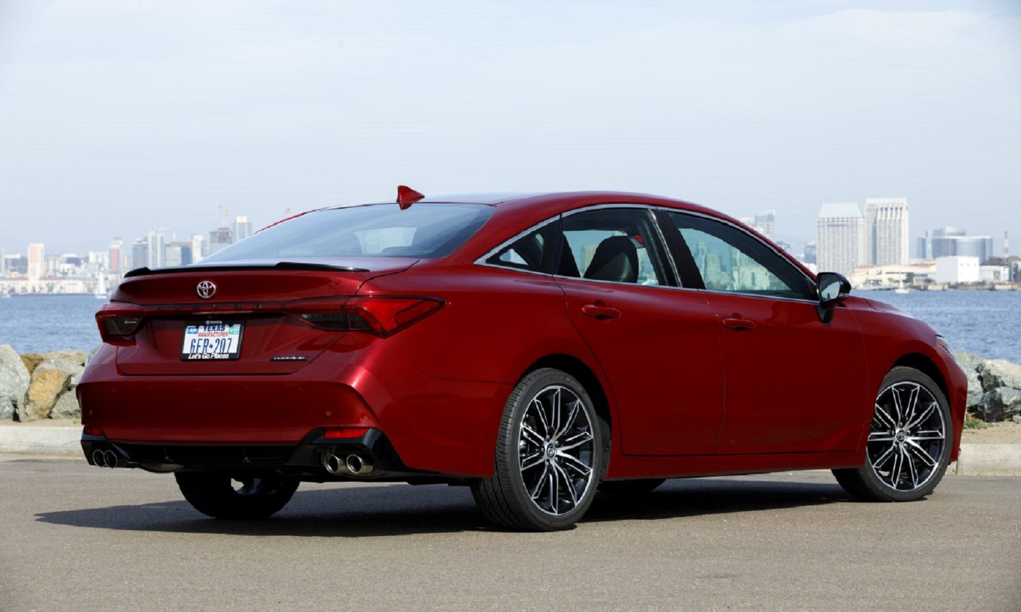 A 2022 Toyota Avalon parked near water. 
