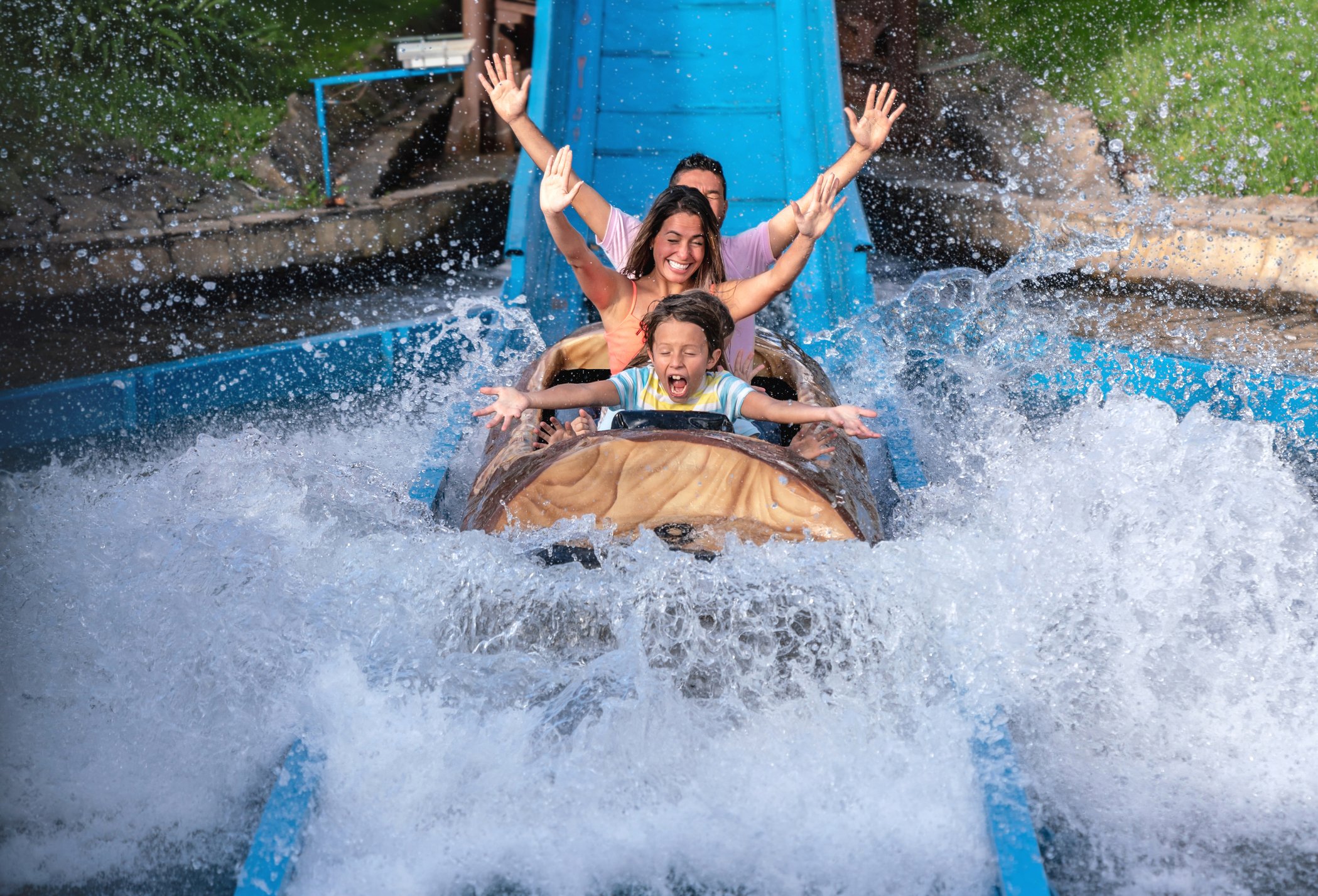 happy family on water park ride