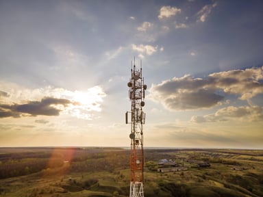 A 5G cell tower at sunset