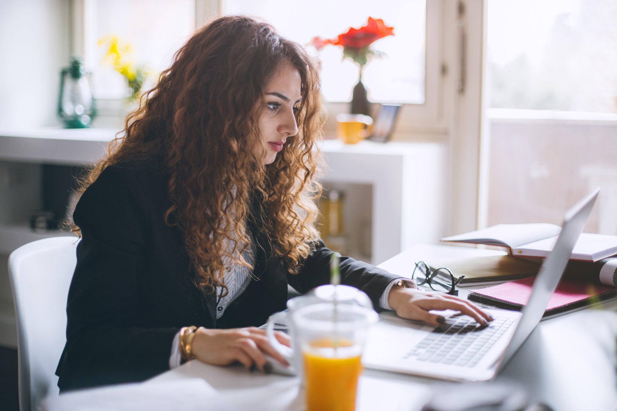 A person looking at a computer.
