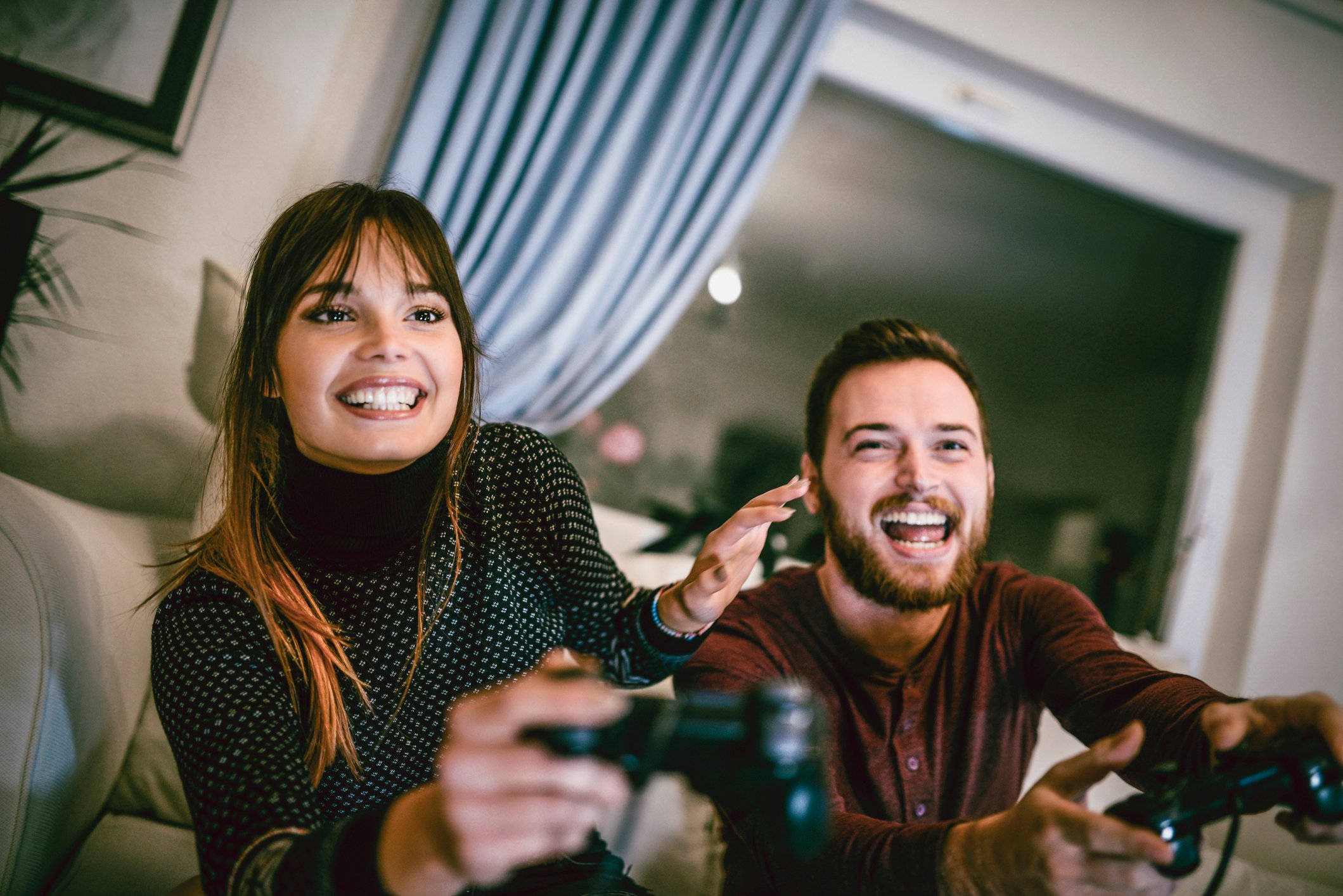 Two people playing video games.