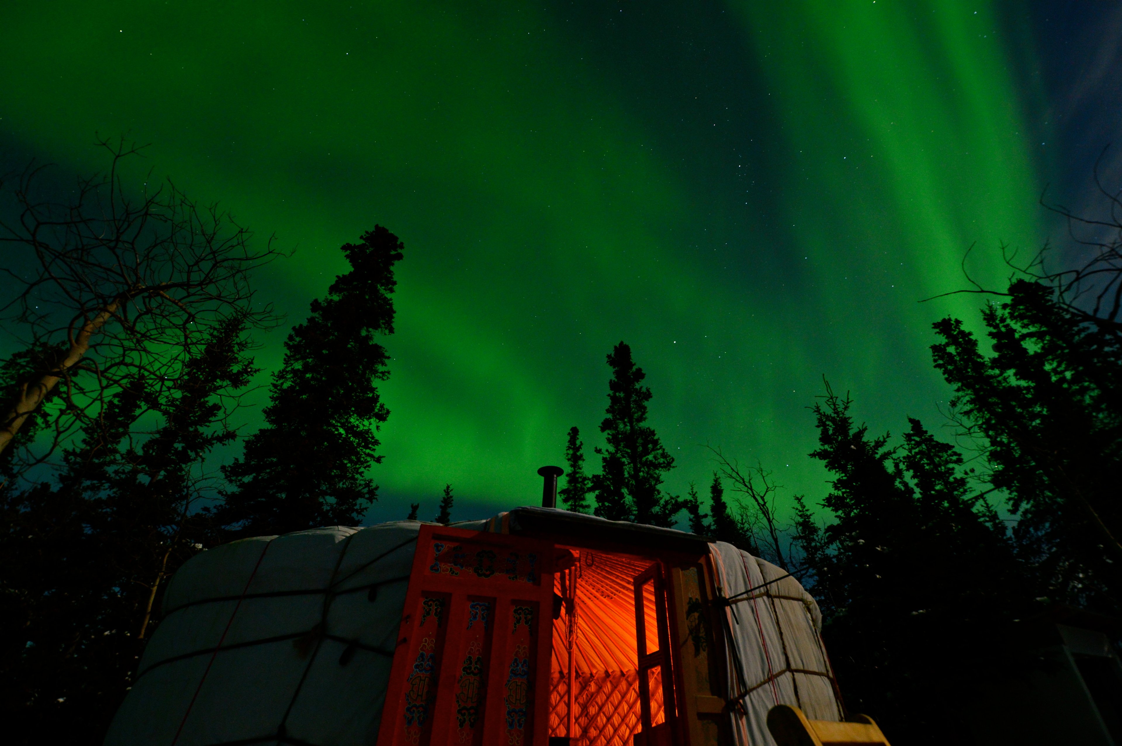 A Mongolian Yurt pictured beneath the northern lights in the Yukon.