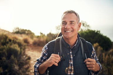 A smiling person outdoors_GettyImages-1142154154