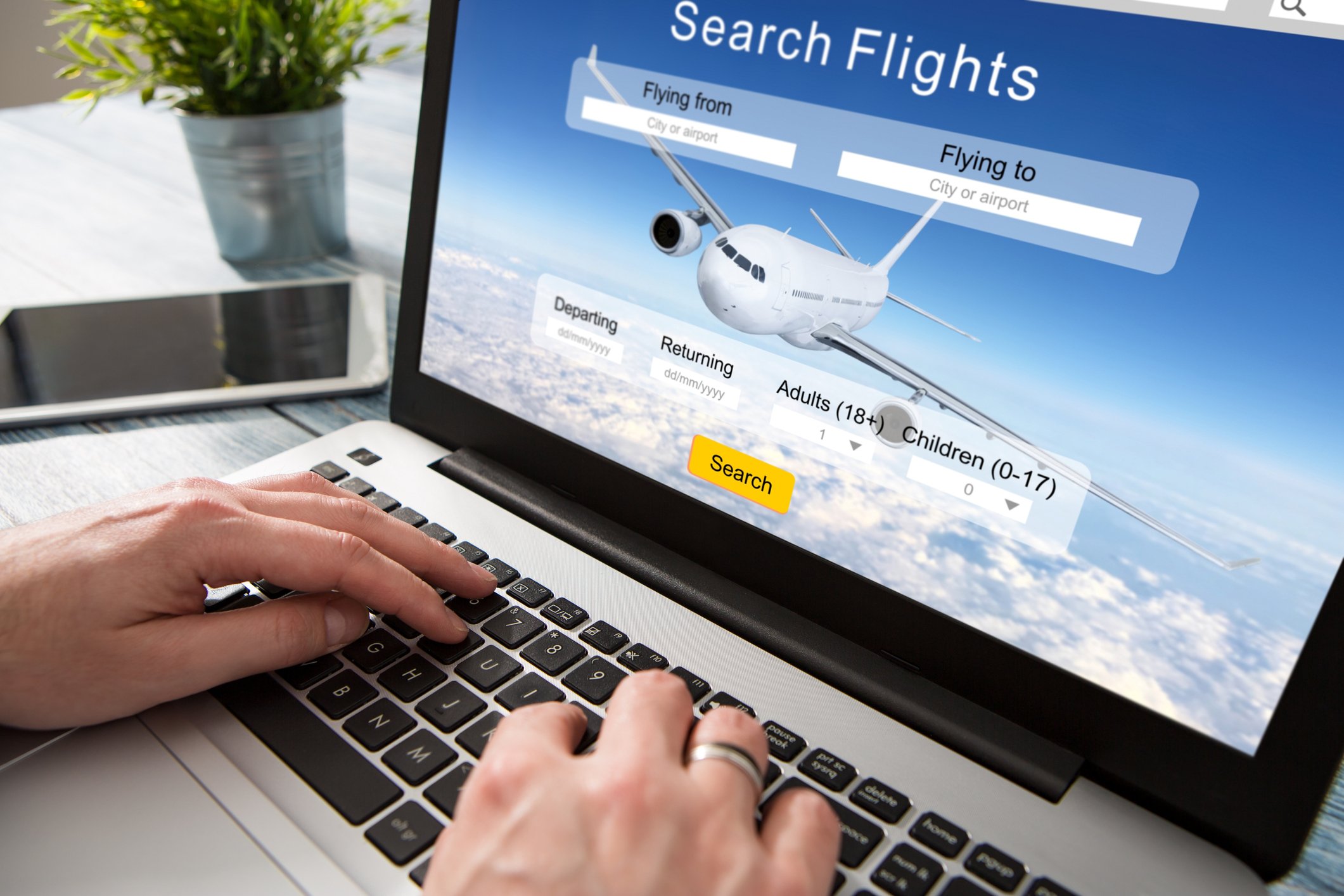 Person booking a flight on a website.