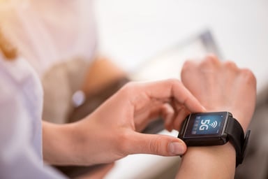 A person using a smartwatch.
