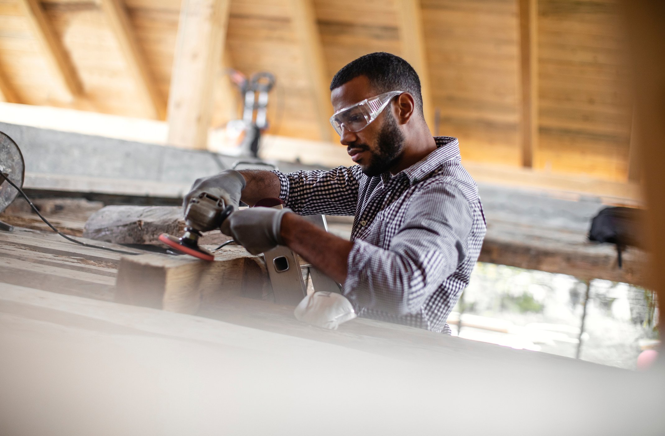A person renovating an attic.