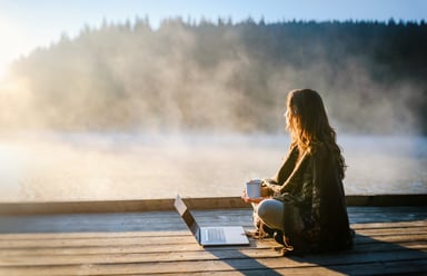 woman relaxing with computer
