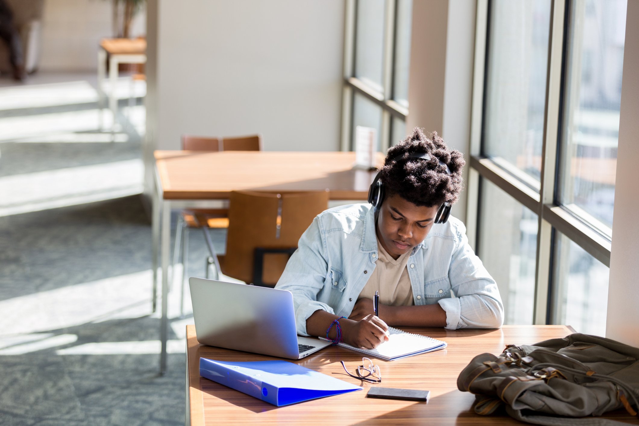 A person doing work at a desk.