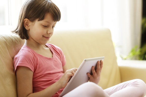 Child using a tablet.