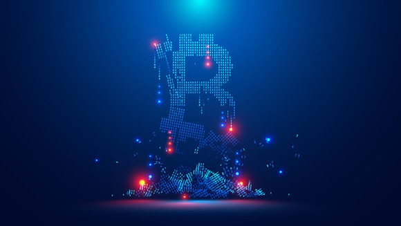 A digital Bitcoin falling apart. 