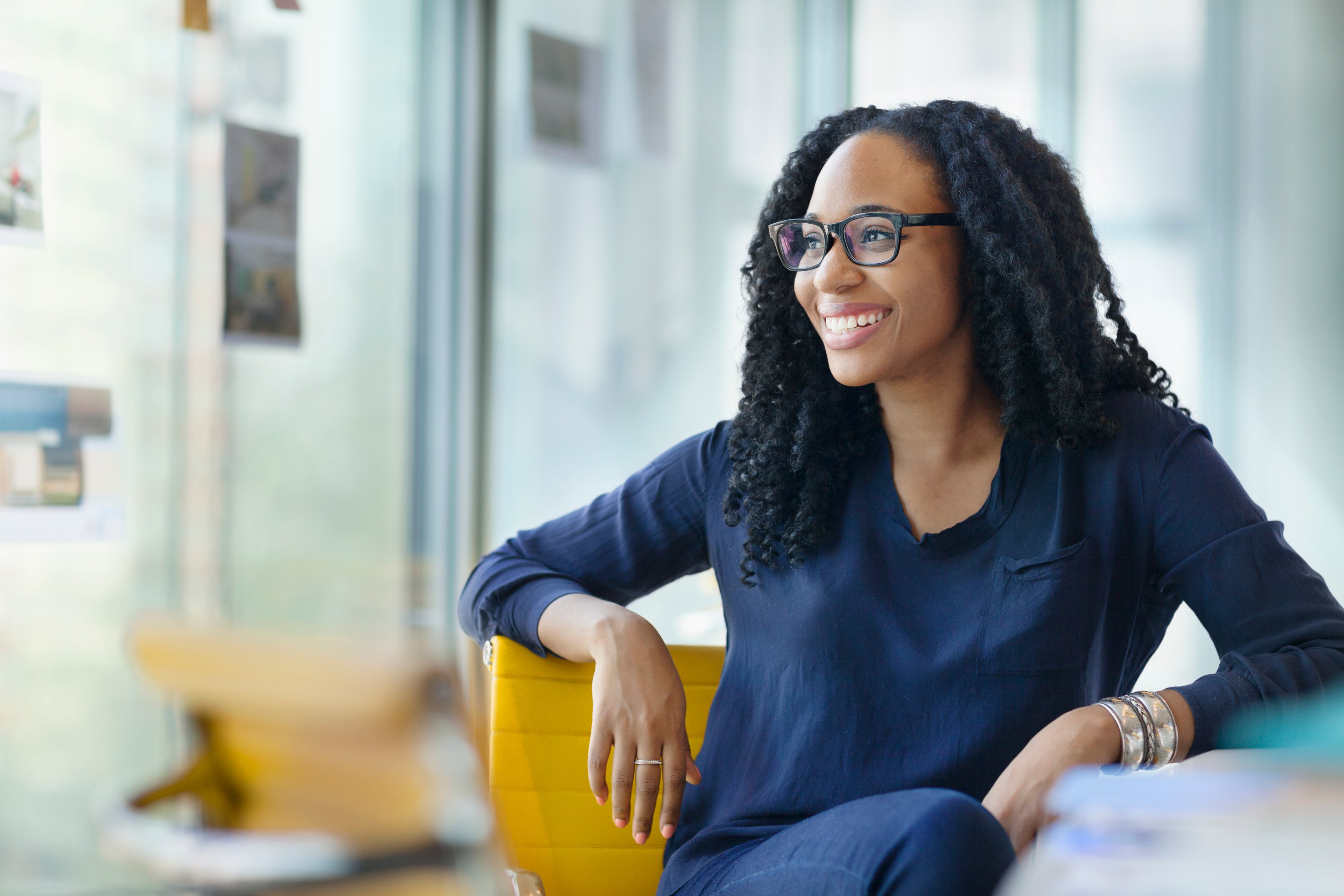 Person sitting at desk in design office.