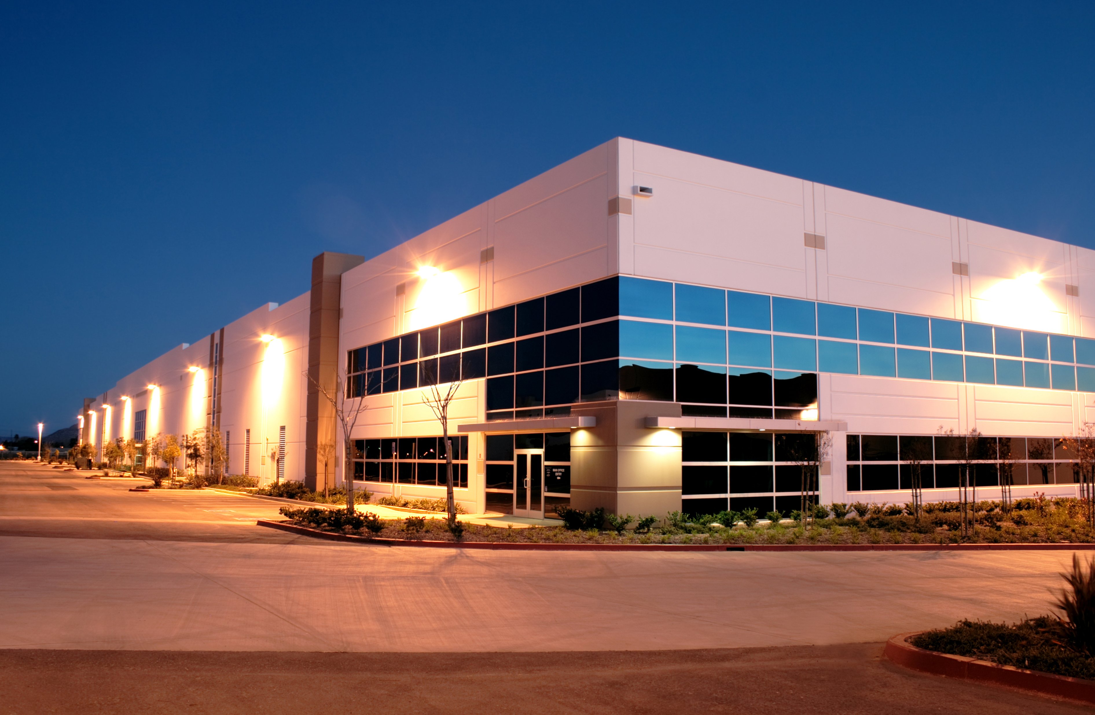 A warehouse building at twilight.