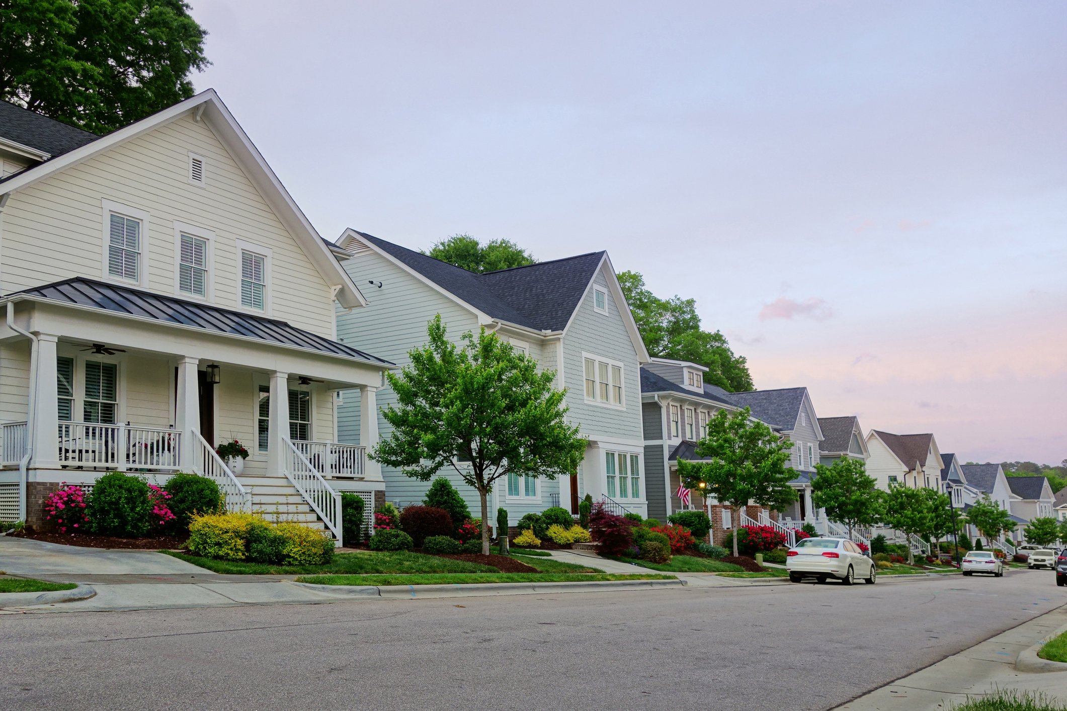 A long street with houses.