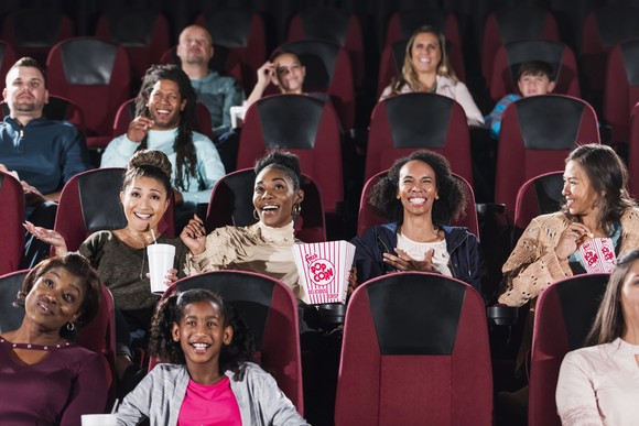A group of people in a movie theater.
