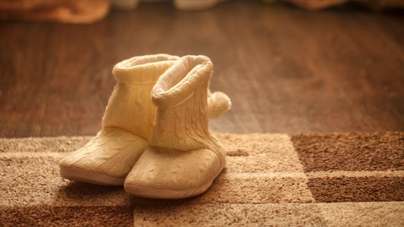 Fuzzy UGG boots on a carpet 