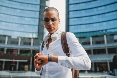 Looking at wristwatch