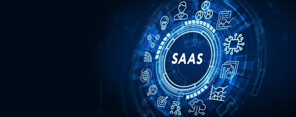 Computer icons in a circle around the word SaaS. 