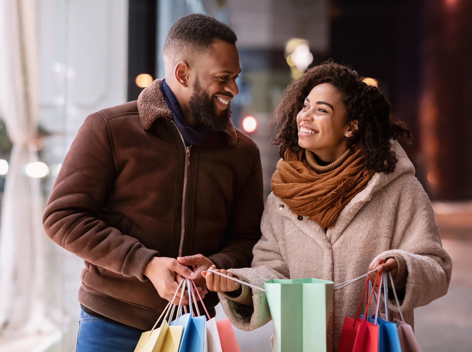 A couple shopping together in a mall.