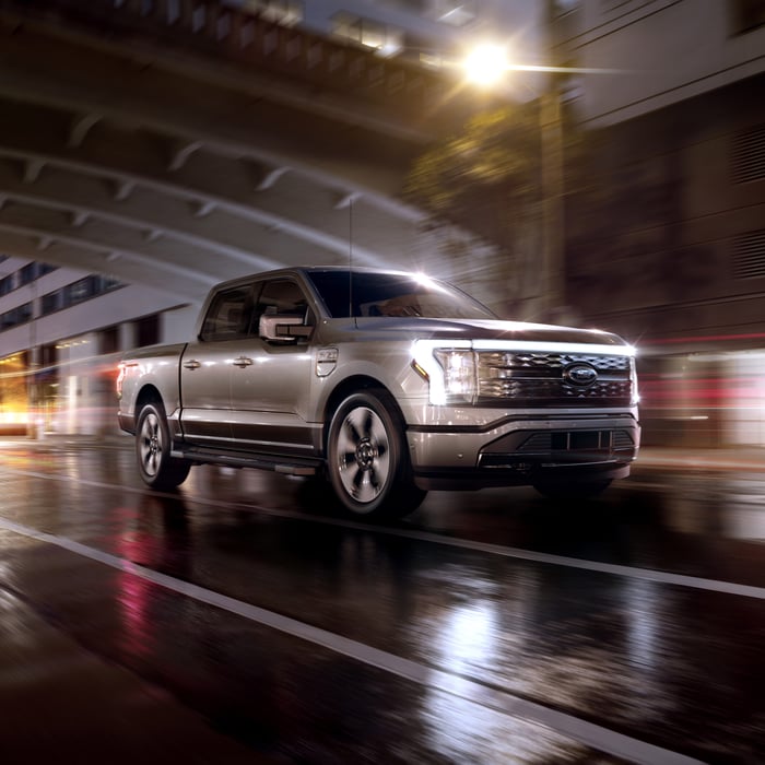 F-150 Lightning driving on the street.