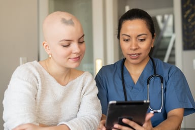 nurse treats alopecia patient