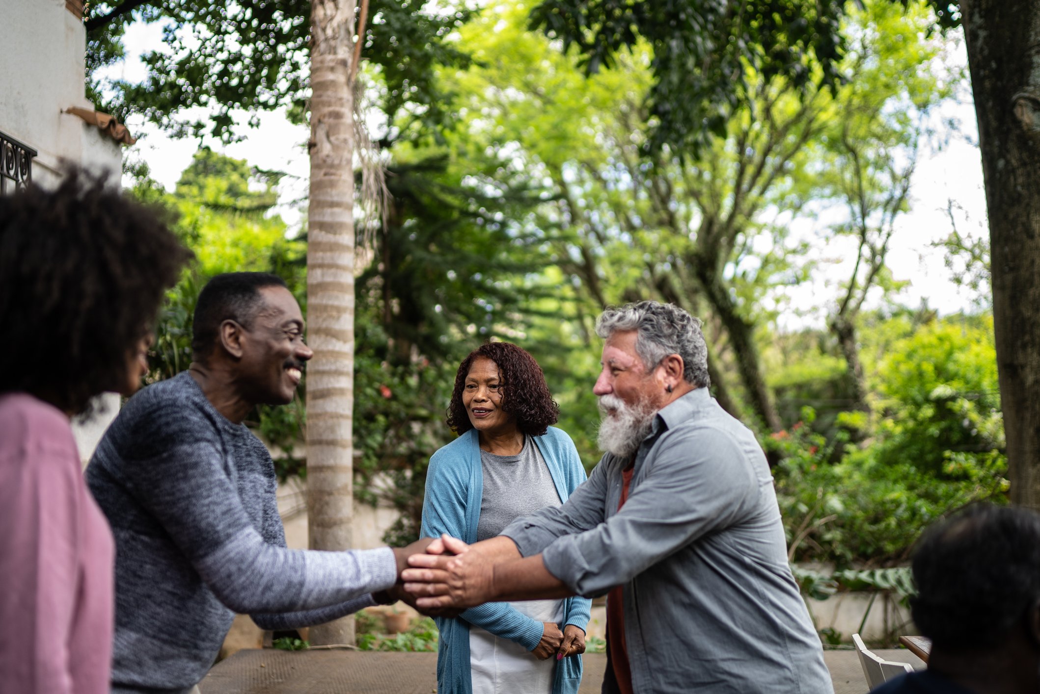 New neighbors meet in front of house