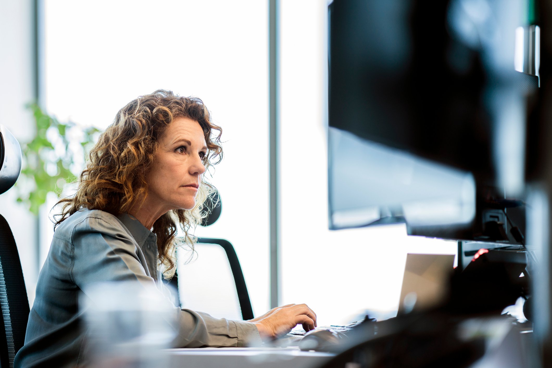 A person at a computer.