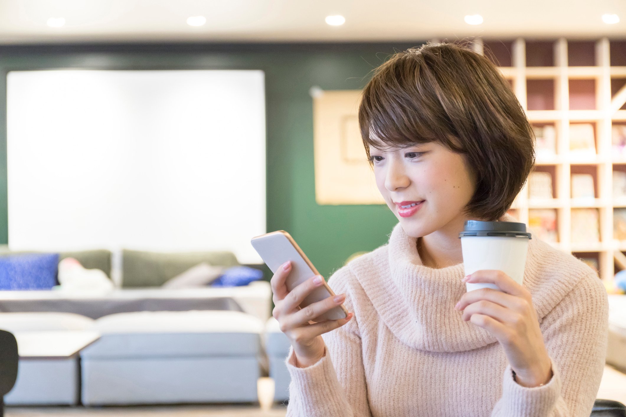 woman looking at smarphone
