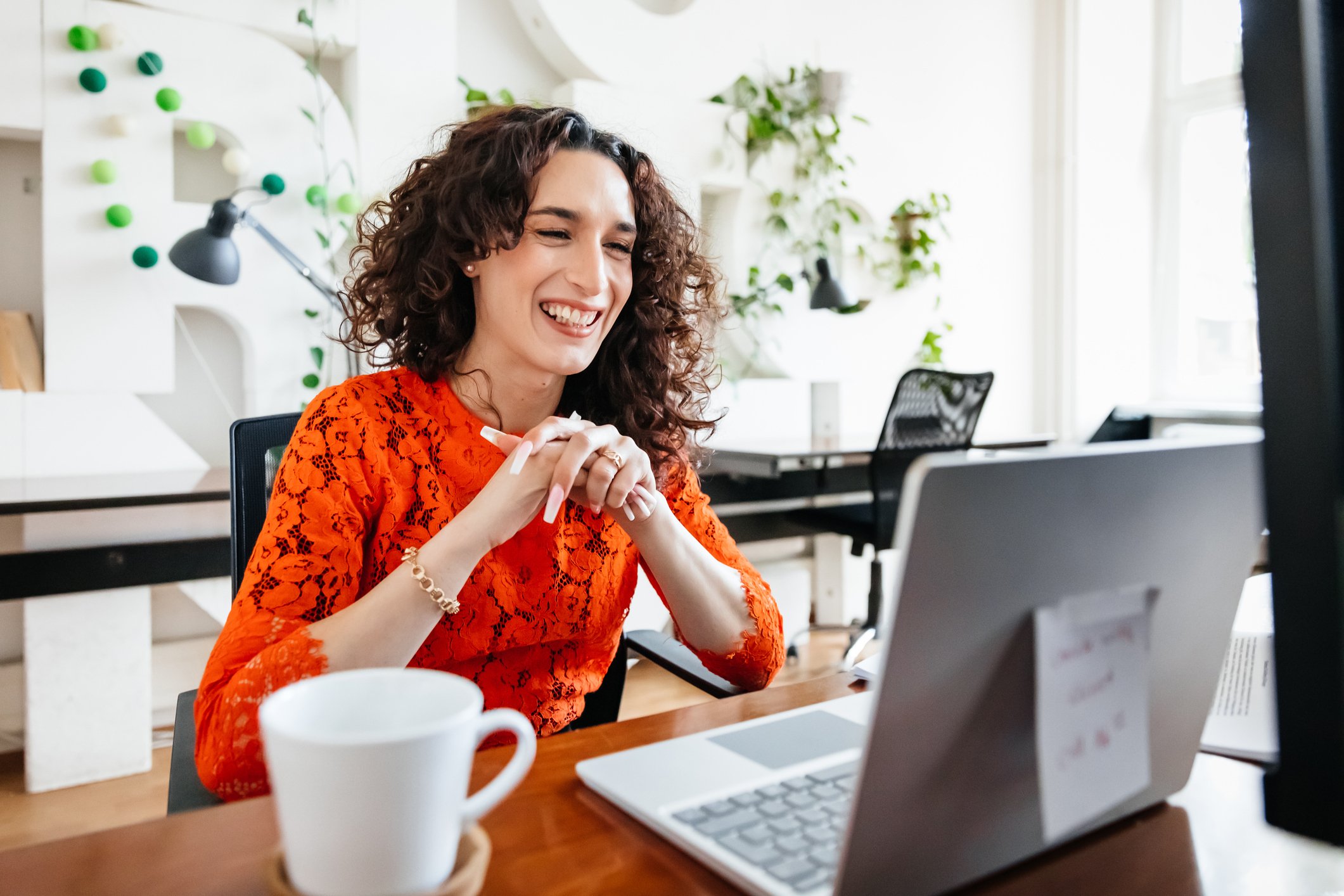 Getty - happy person at computer