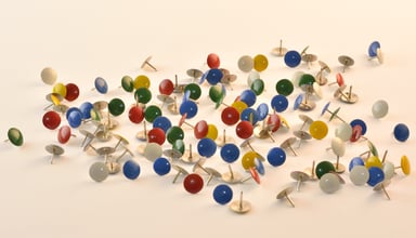 A jumble of colorful pushpins