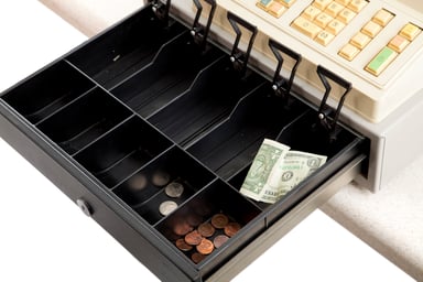 Cash register with very little money inside