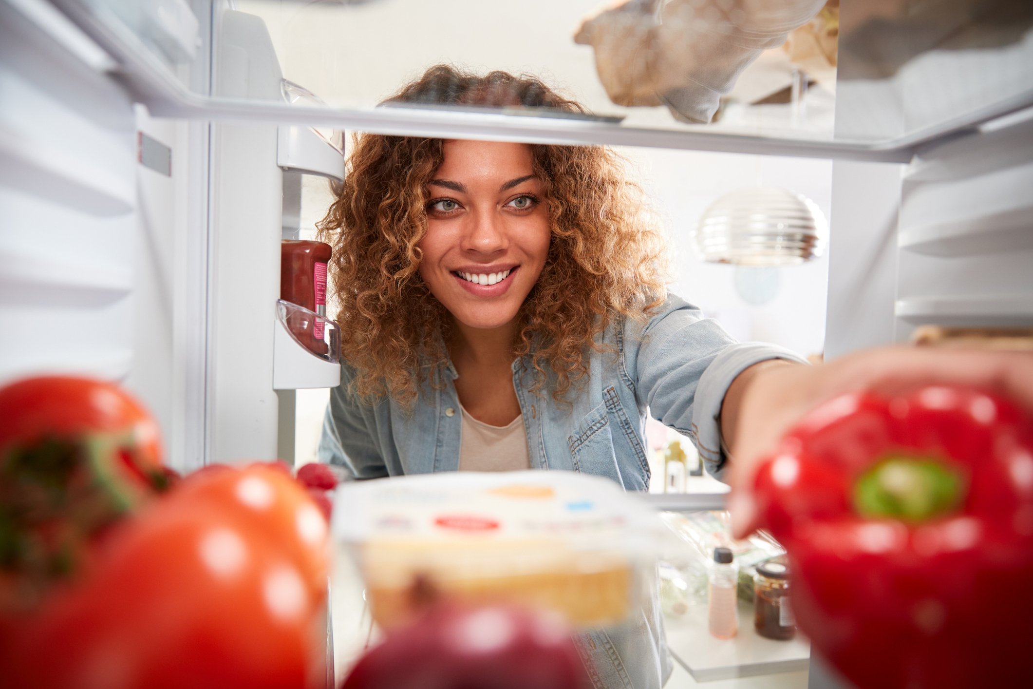 Person looking in a fridge