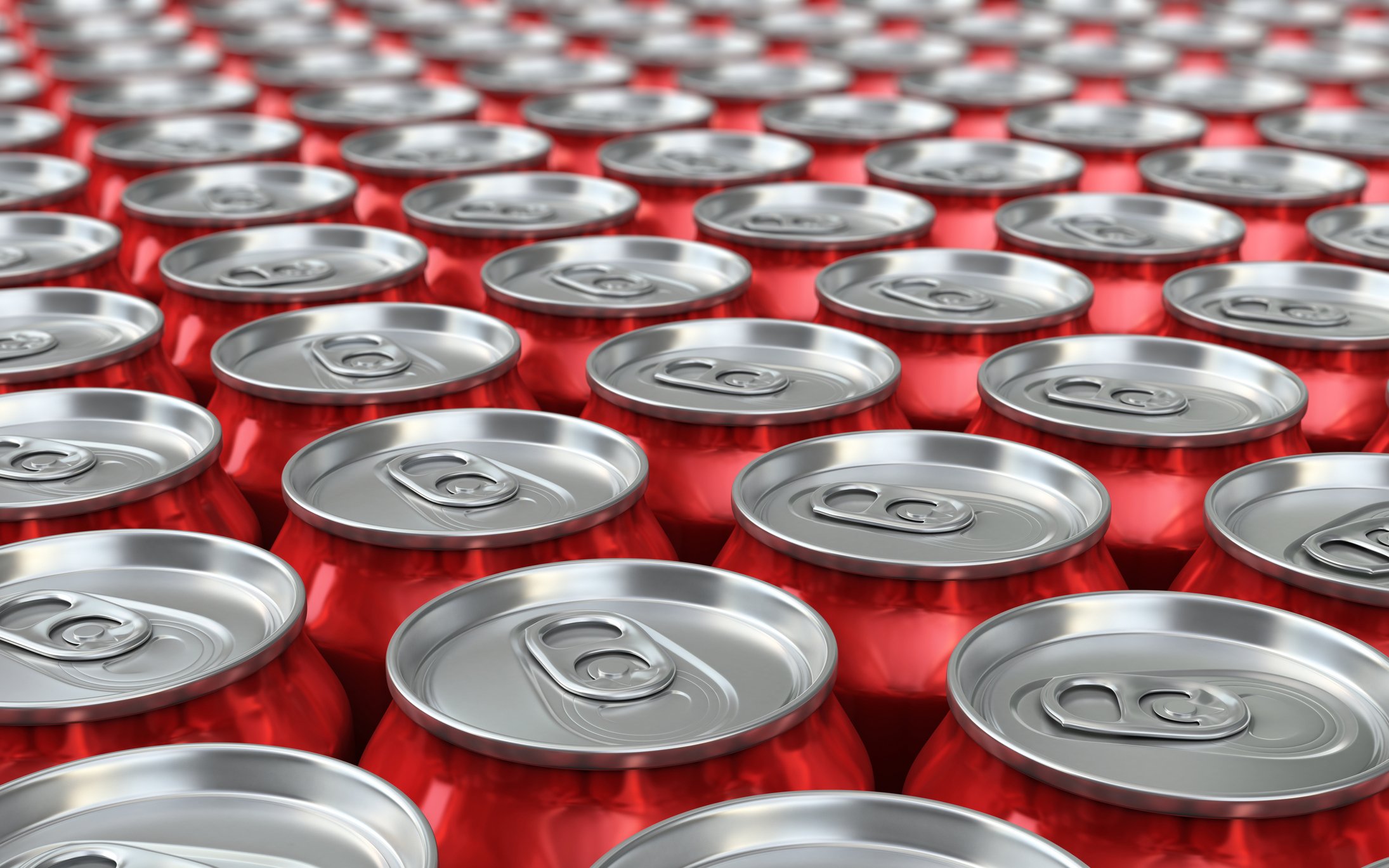 Rows of red soda cans.