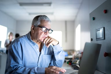 person on computer