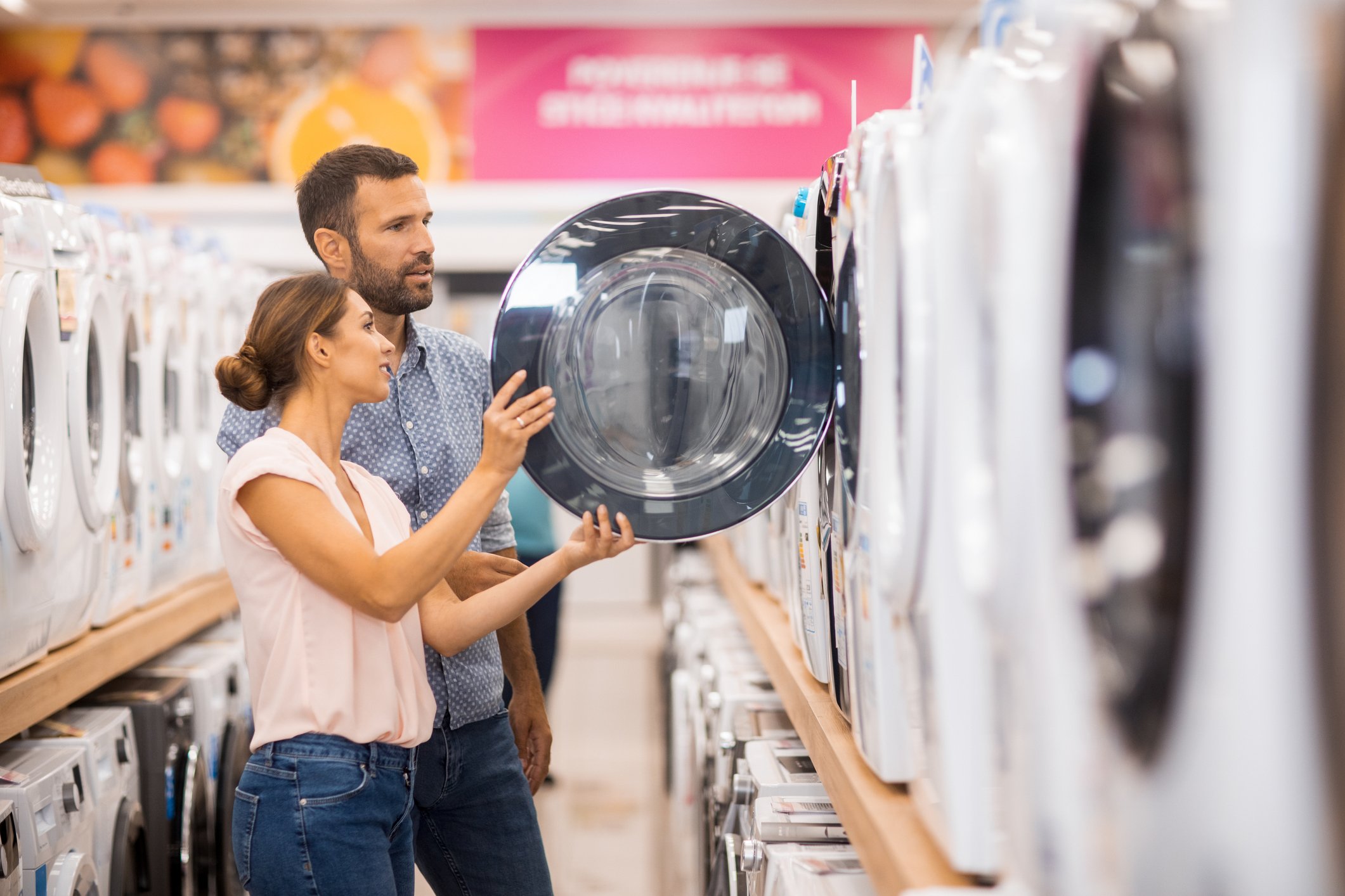 Couple shopping for home appliances