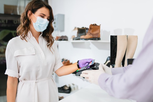 A customer pays with a credit card.