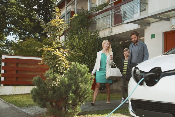 Family charging electric car