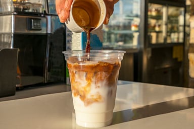 A-Barista-Prepares-An-Iced-Coffee