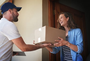 person getting a package delivered
