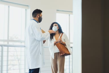 A doctor talks to a patient