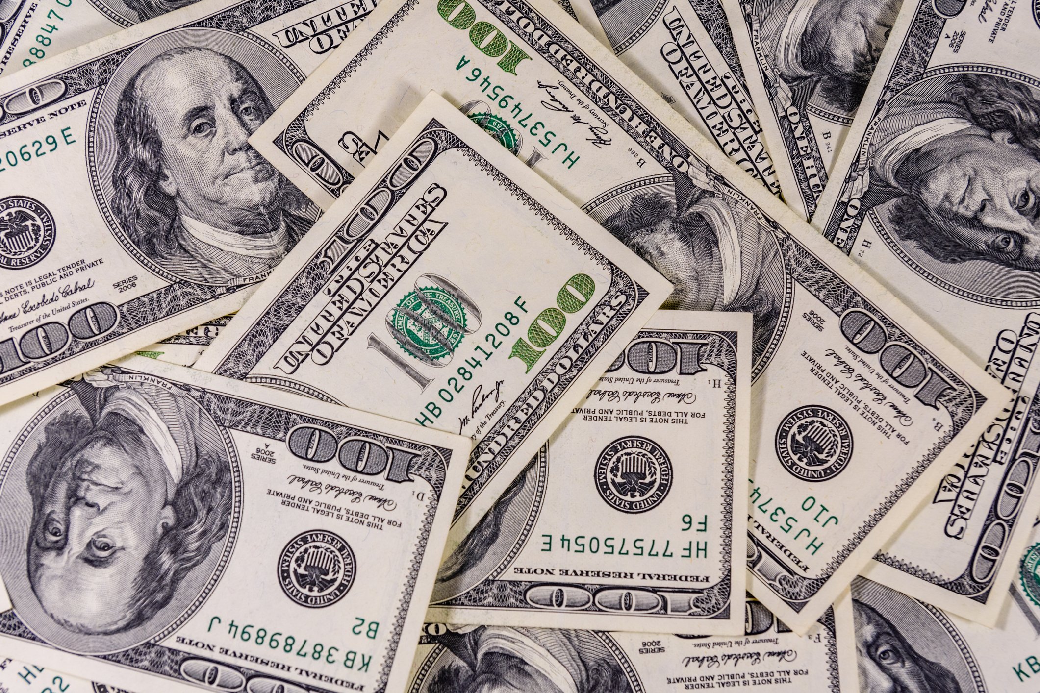 GettyImages-cash-money-stacks-hundreds