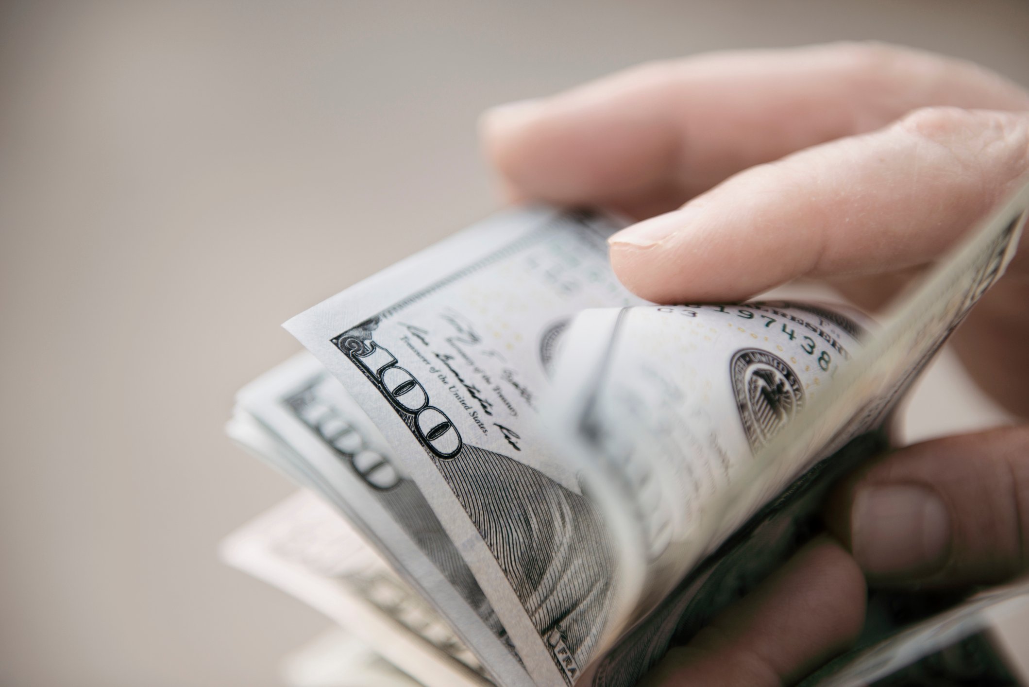 Stacks-hundred-dollars-cash-money-growth-stock