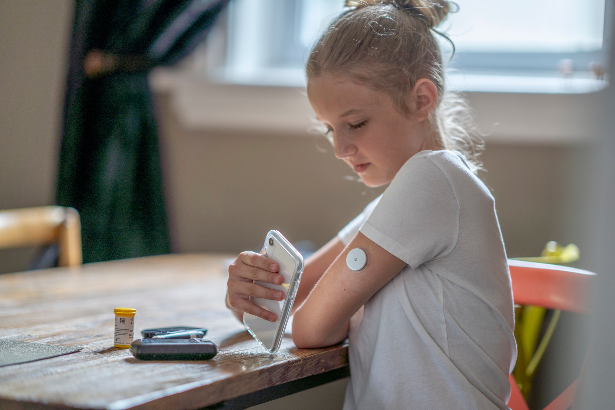 diabetes patient with continuous glucose monitor