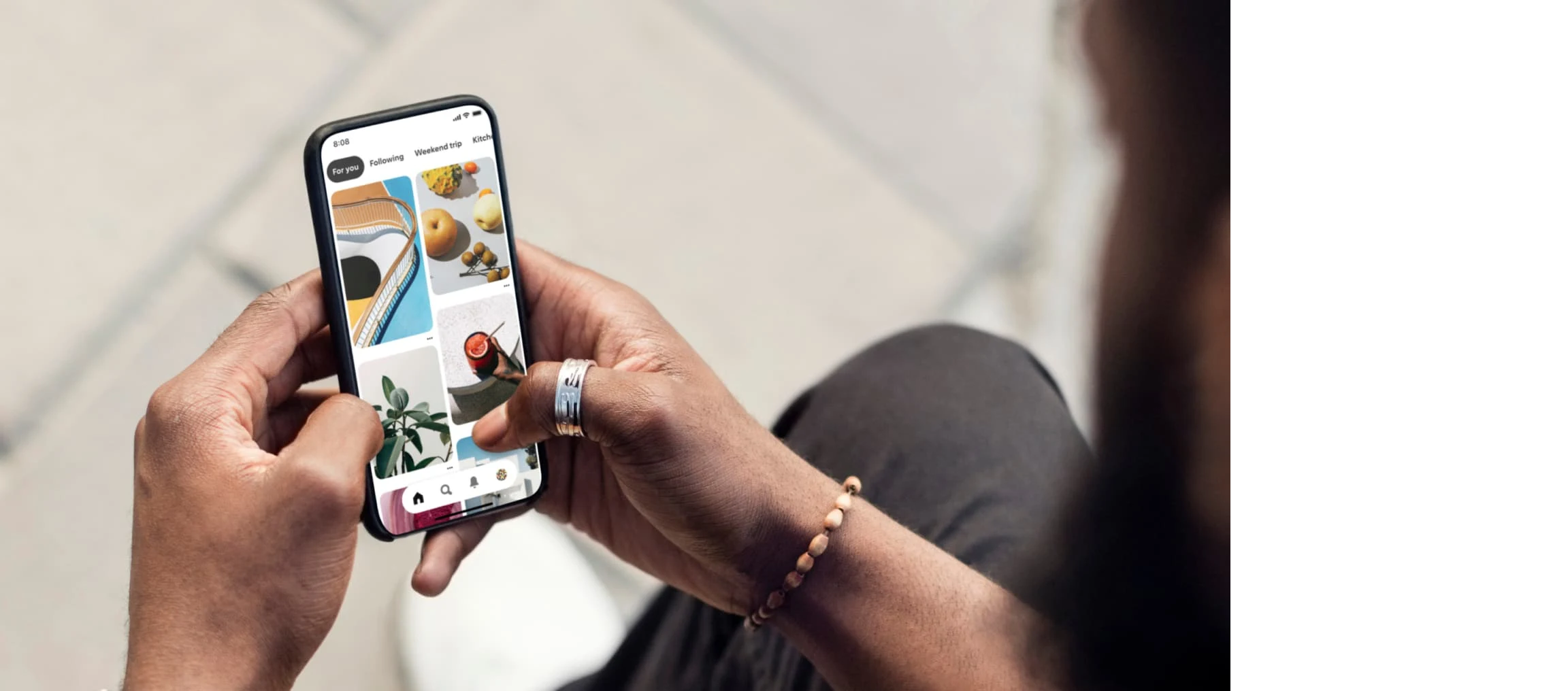 A person using the Pinterest app.