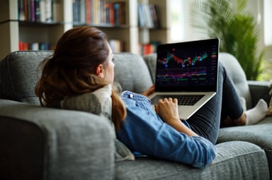 investor tracking stocks at home