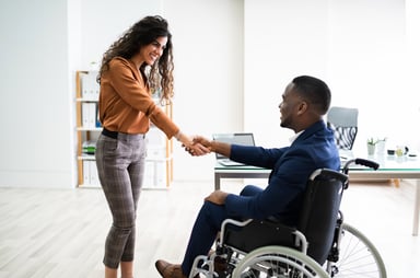 business people shaking hands over a deal