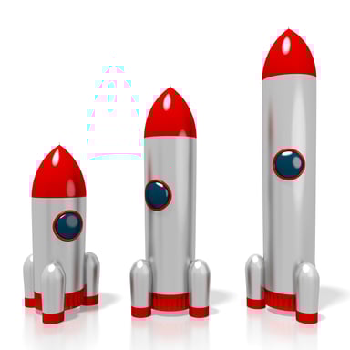 3 spaceships of progressively larger size.