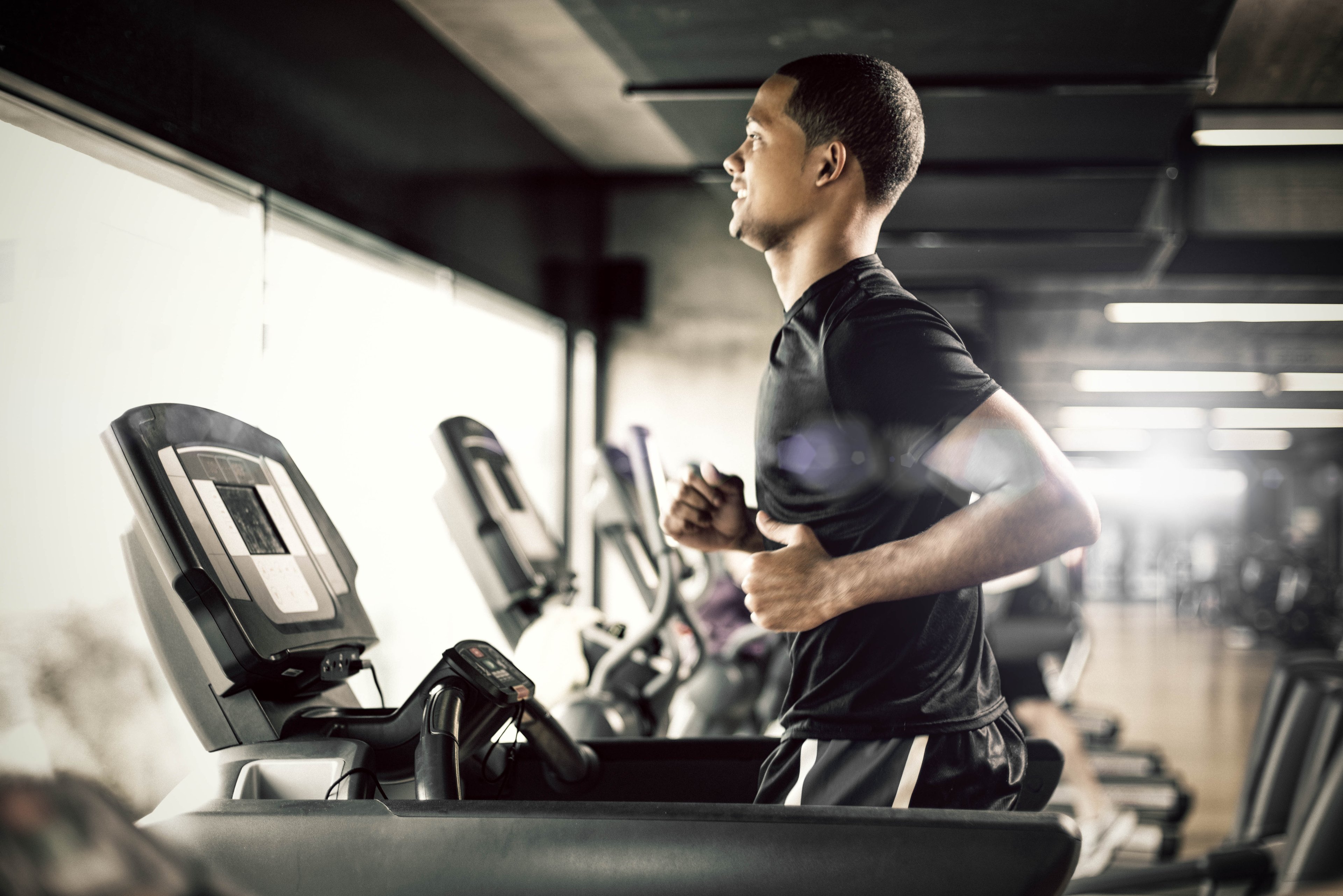 exercising jogging on treadmill workout man gym
