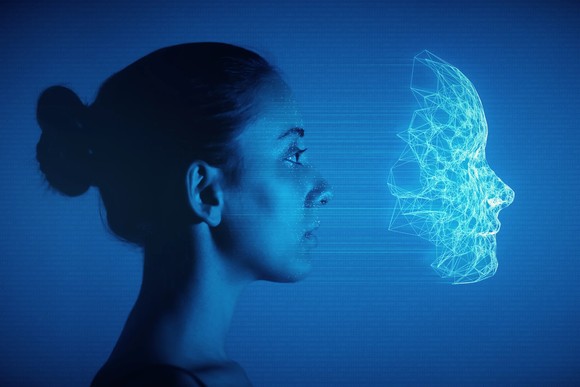 A person's face being scanned digitally.