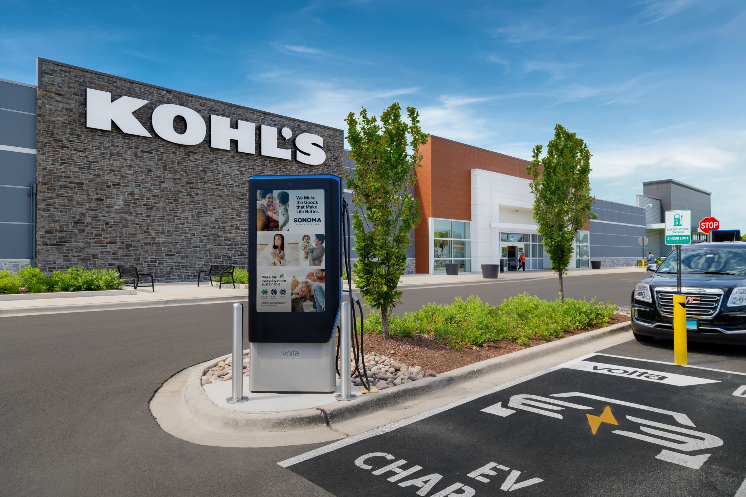 An EV charging station outside a Kohl's store.